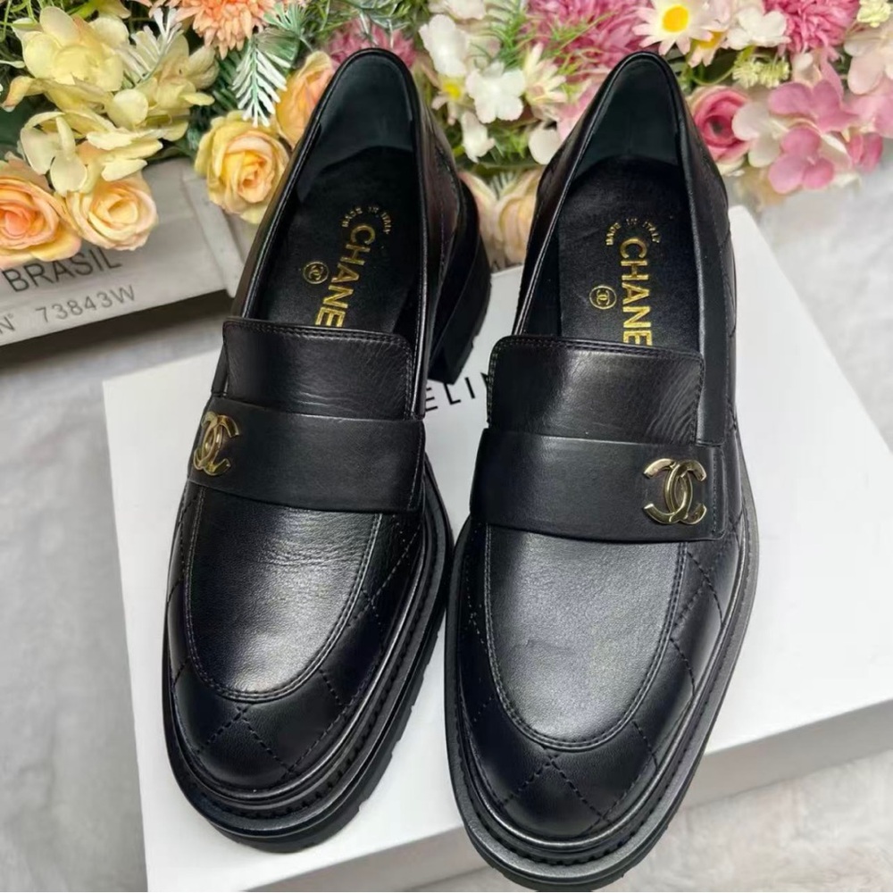 CHANEL Black Leather Loafers with Gold Logo